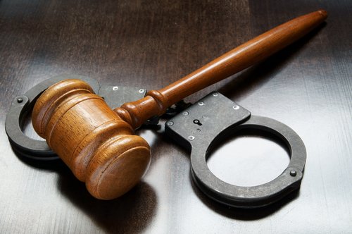 Gavel and handcuffs