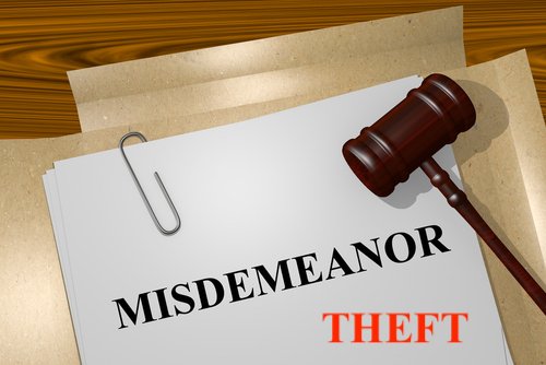 gavel over a file that says "misdemeanor theft"