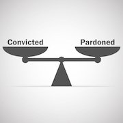 Scale that shows the words convicted and pardoned. 