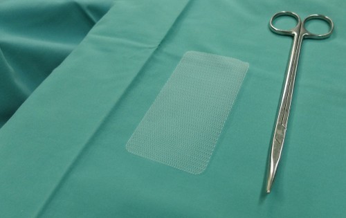 Surgical mesh tool