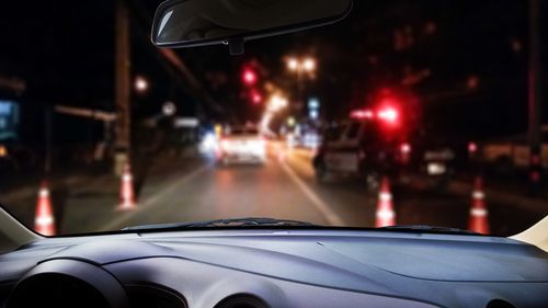 car approaching a DUI sobriety checkpoint