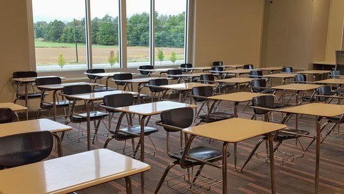 empty classroom filled with desks