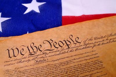 US Constitution and American flag