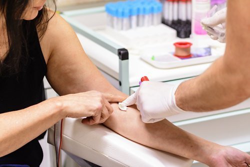 person submitting to a blood test