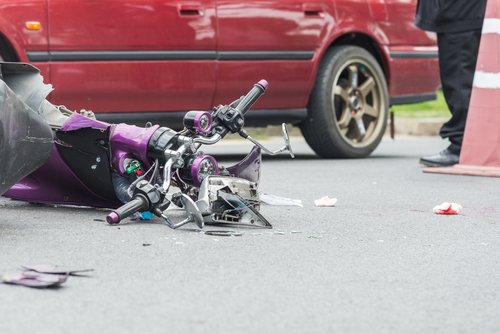 Aftermath of motorcycle crash with a car - Nevada motorcycle accident law allows injury victims to sue for damages
