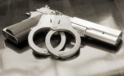 Img gun handcuffs