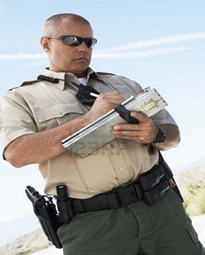 police officer writing a ticket