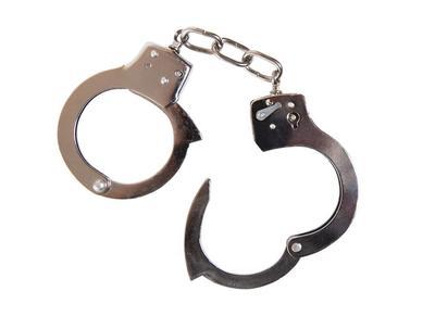 Handcuffs against a white background