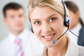 smiling law firm receptionist with headset on