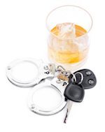 Alcohol glass, cuffs, and car keys