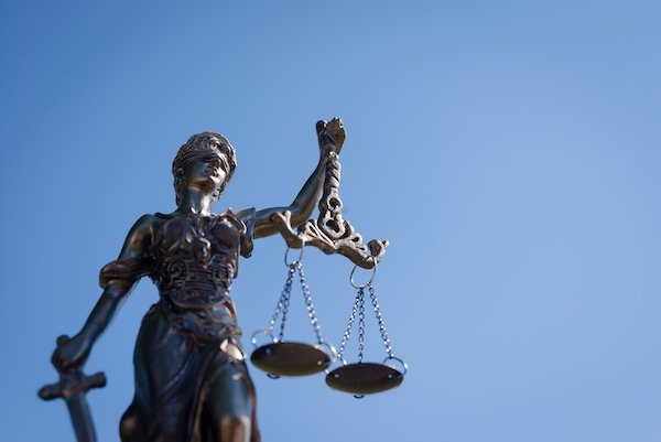 Lady Justice holding her scales of justice, indicating that everyone is guaranteed equal rights. 