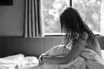 Mujer en la cama