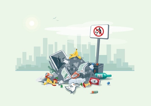 pile of garbage with city skyline in the background - illegal dumping can be a crime under California Penal Code 374.3 PC