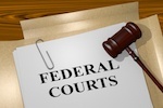 gavel over a document that reads "Federal Courts"