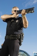 police officer aiming gun