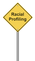 Sign that says "racial profiling"