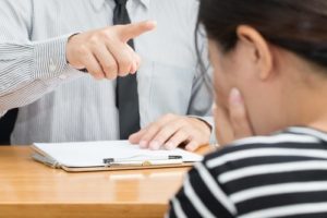 Man intimidating a witness.