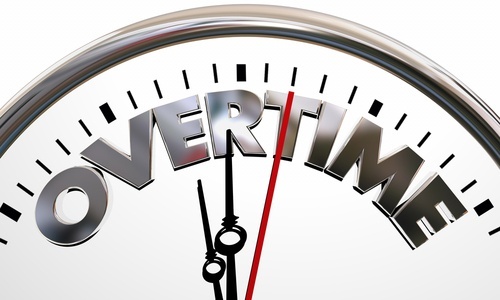 Clock with "Overtime" written on it