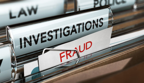 archivadores etiquetados fraude, investigaciones, ley y policía