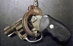 gun and handcuffs