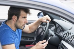 Getaway driver waiting to help his accomplice flee the scene