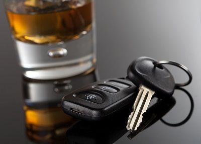 set of car keys next to a shot of whiskey - victims injured by a DUI driver in Nevada can bring a civil lawsuit
