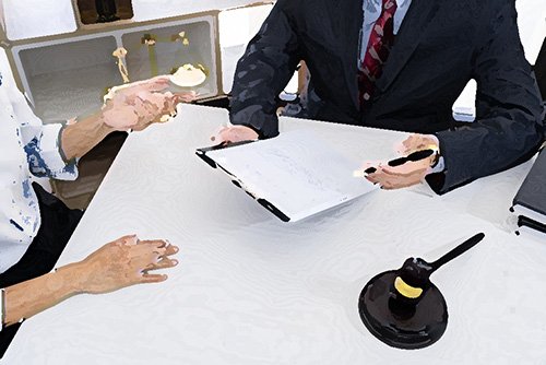 attorney reviewing documents with client