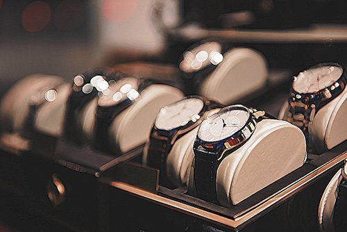two rows of seven expensive watches in their display boxes that someone received in violation of PC 496