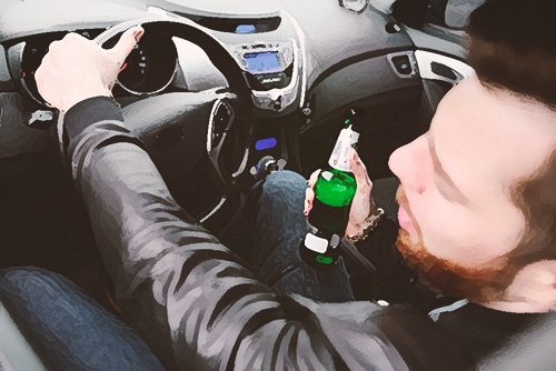 man driving with an open beer in his car