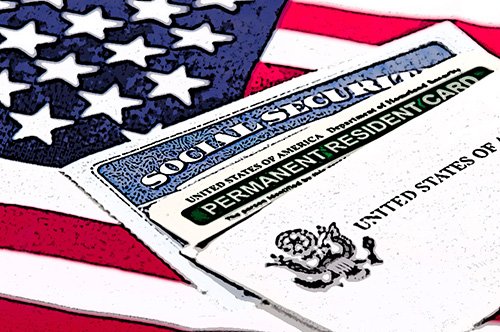 social security card and green card on American flag - injured undocumented workers are generally entitled to workers' compensation benefits in California