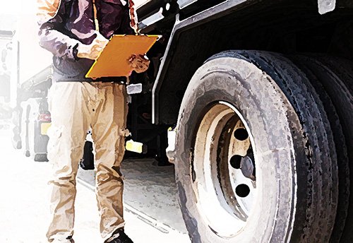 inspector taking note of a big rig - Vehicle Code 42002.1 VC makes it a misdemeanor for the driver of a commercial vehicle to fail to stop and submit to an inspection