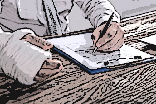 injured worker filling out workers comp form