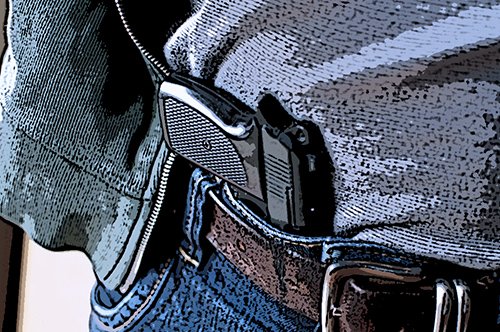pistol inside man's waistband - California gun laws no longer allow for this type of open carry