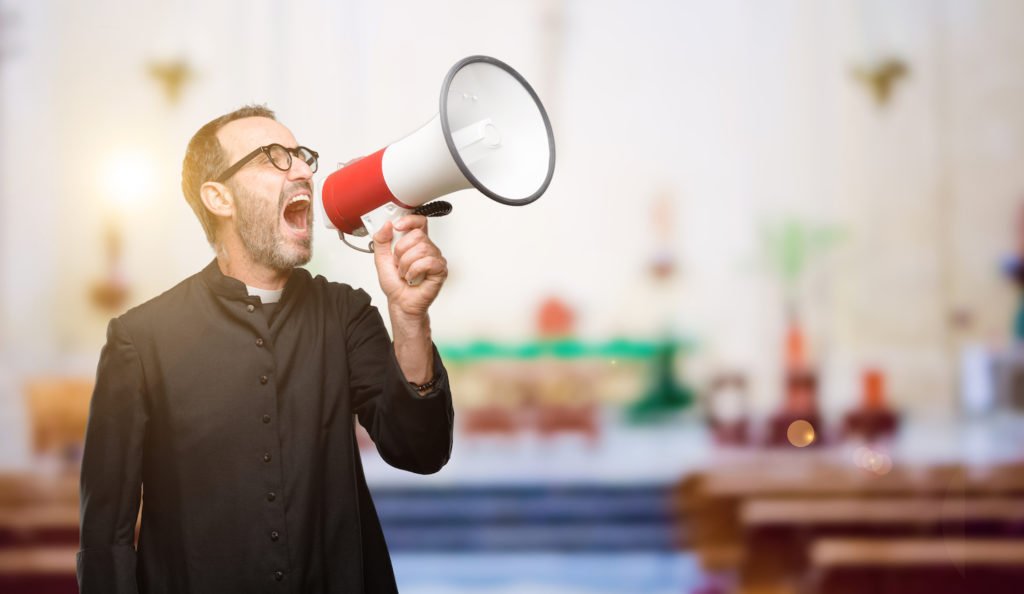 Man disturbing a meeting with a megaphone