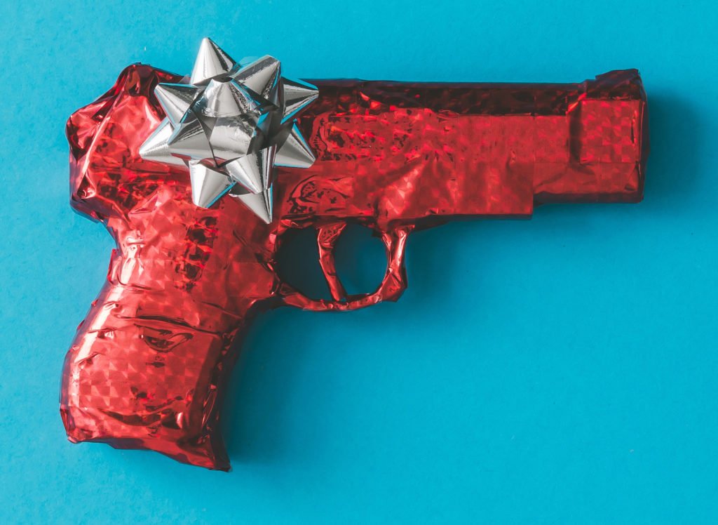 Gift-wrapped gun intended for a convicted felon in violation of CRS 18-12-111.