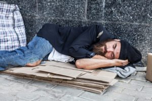 Homeless man violating the new Las Vegas encampment ordinance.