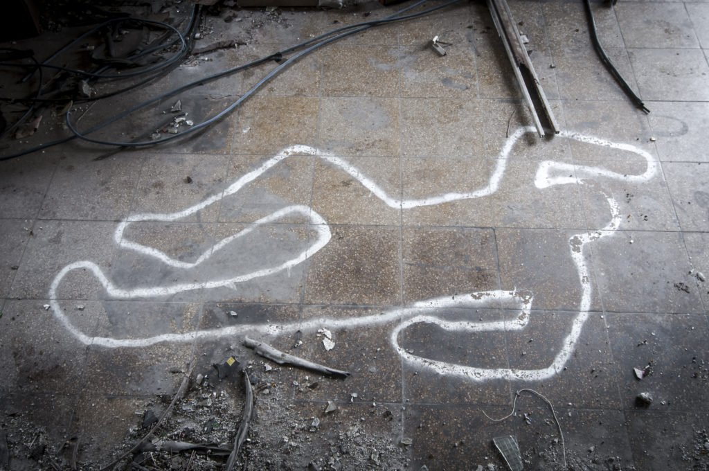 Outline of body in chalk on floor