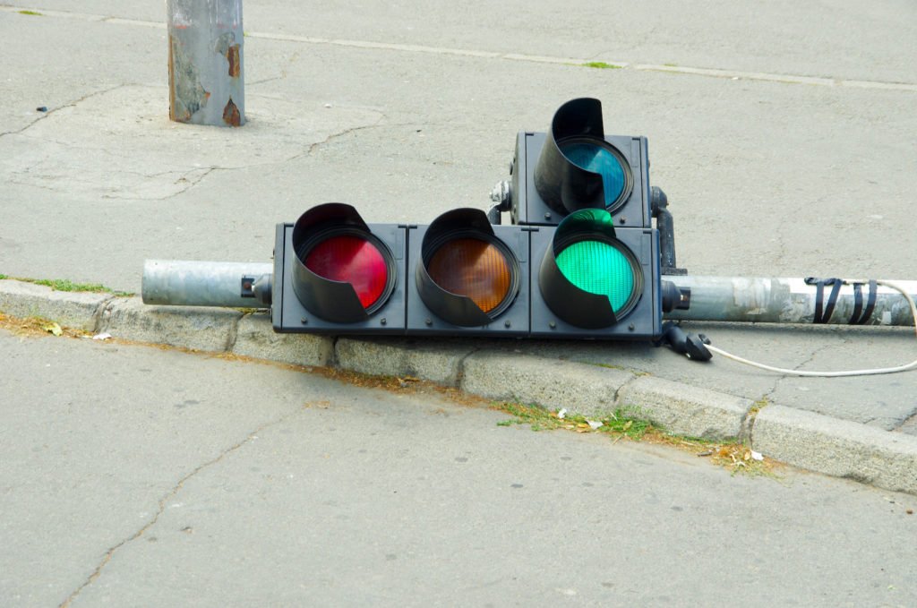 Knocked over traffic light on the sidewalk