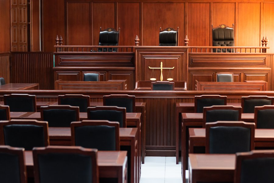 empty appellate courtroom with wood paneling