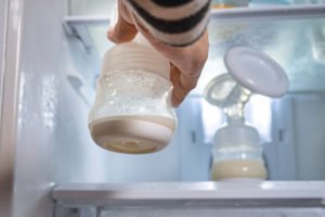 Bottles of freshly pumped breastmilk