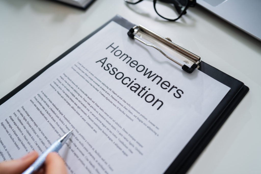 Clipboard with paper that says homeowners association