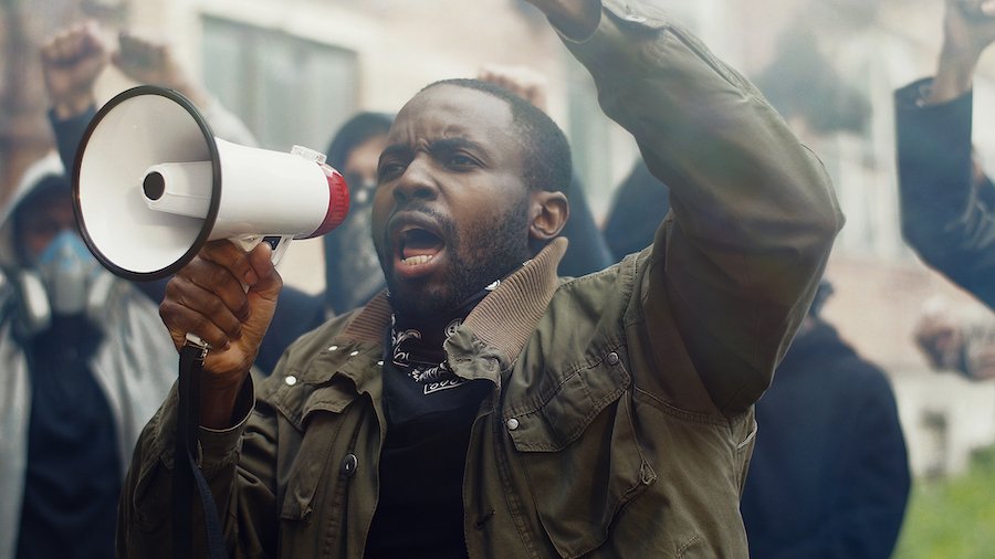 Man with megaphone during peaceful protest