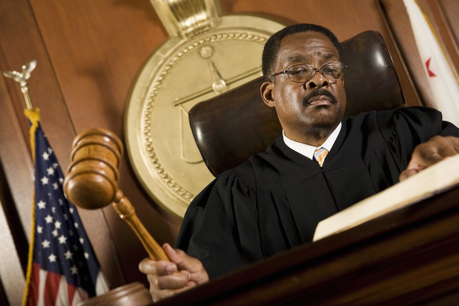 judge pounding gavel