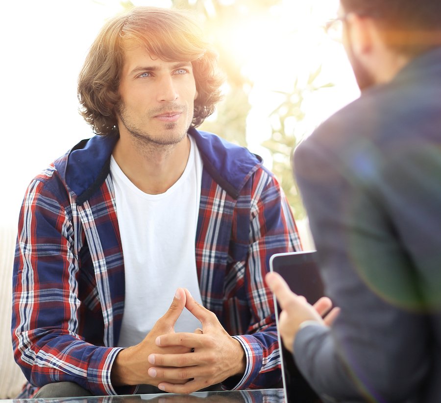 Defendant meeting with a Las Vegas child abuse lawyer
