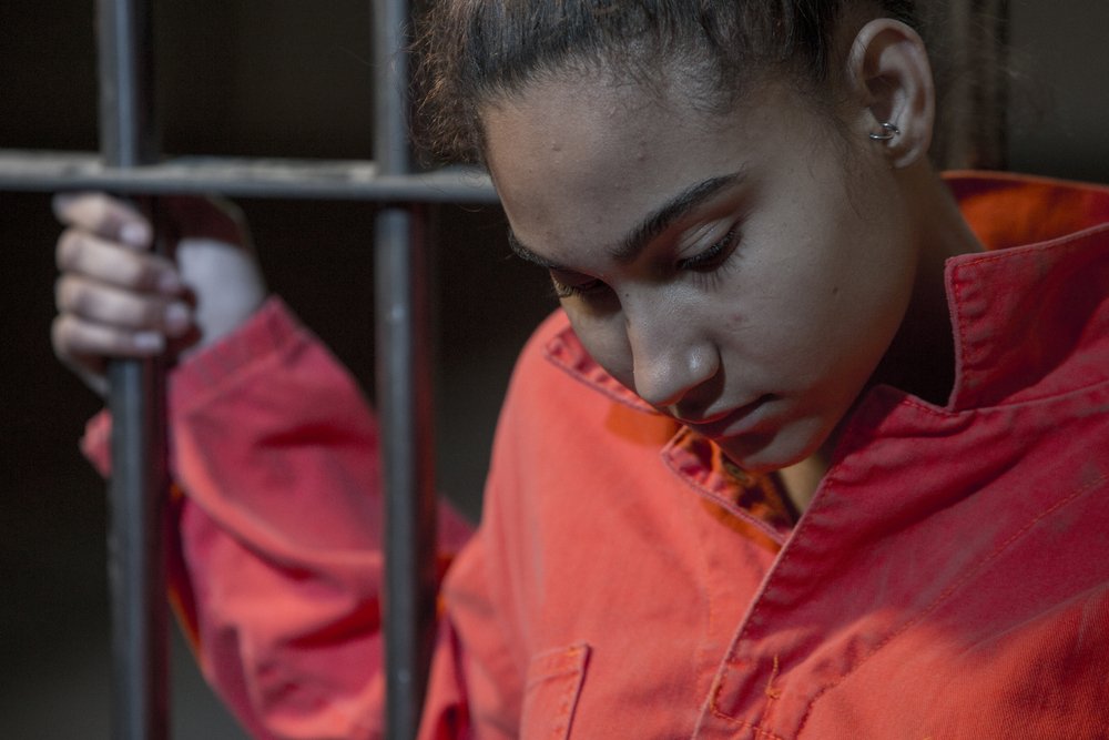young woman in jail