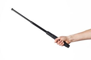 Hand holding expandable baton