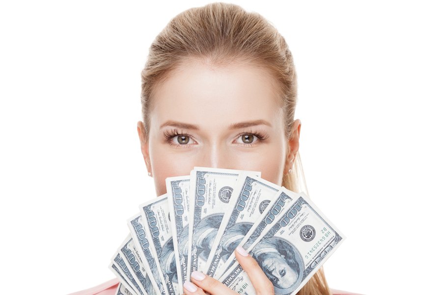 Female crime vitim holding up cash