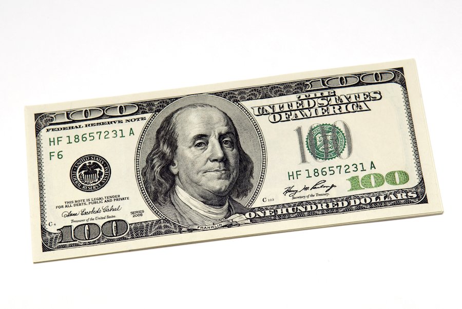 A pile of hundred dollar bills