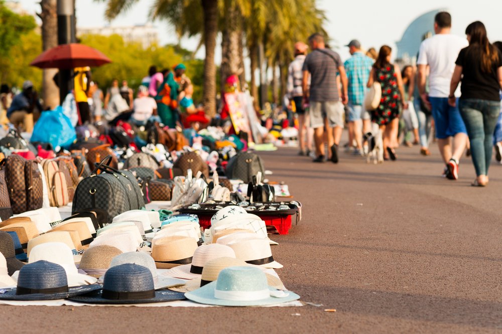 Counterfeit goods being sold on a boardwalk
