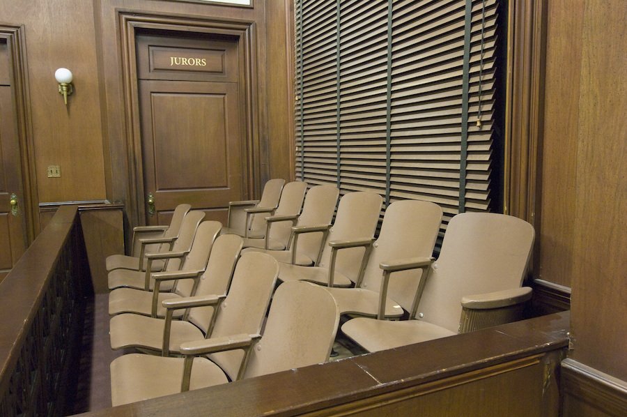 Side view of a empty jury box in the courthouse